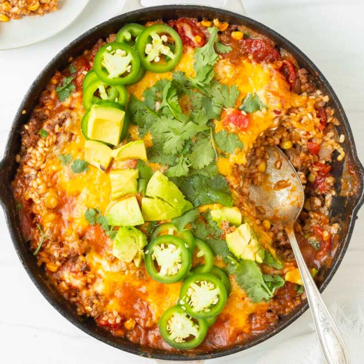 This beef enchilada skillet is a fan-favorite one-pan dinner recipe perfect for a healthy weeknight dinner. The beef enchilada skillet is made with pantry ingredients, packed with flavor and is great for meal prep too.