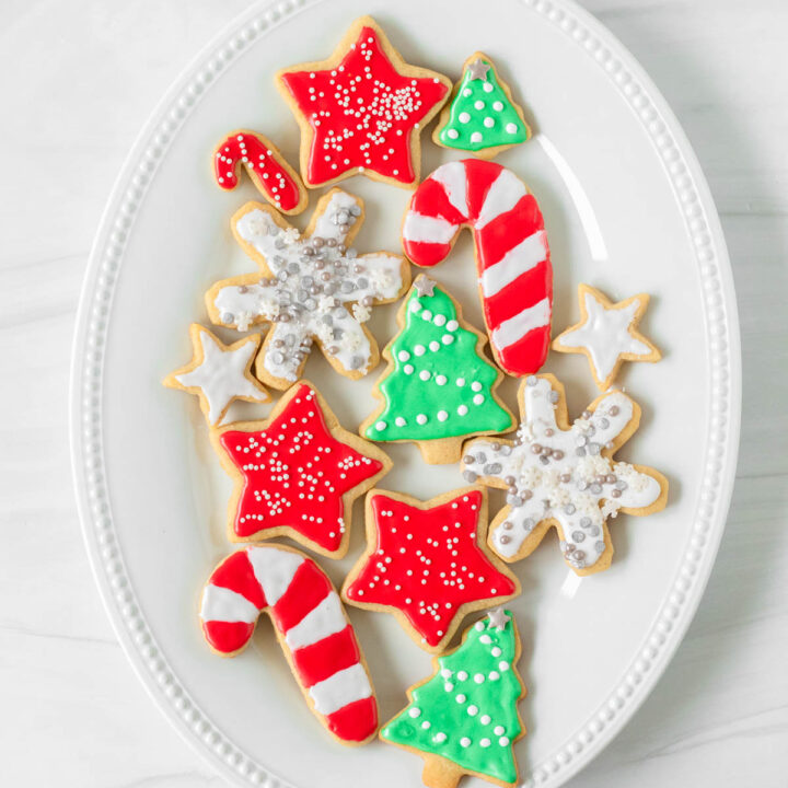 These gluten-free cut-out sugar cookies are thick and buttery sugar cookies made with simple ingredients perfect as a Christmas sugar cookie recipe. These cut-out sugar cookies are also great for holidays like Easter, Fourth of July, birthday parties and other events.