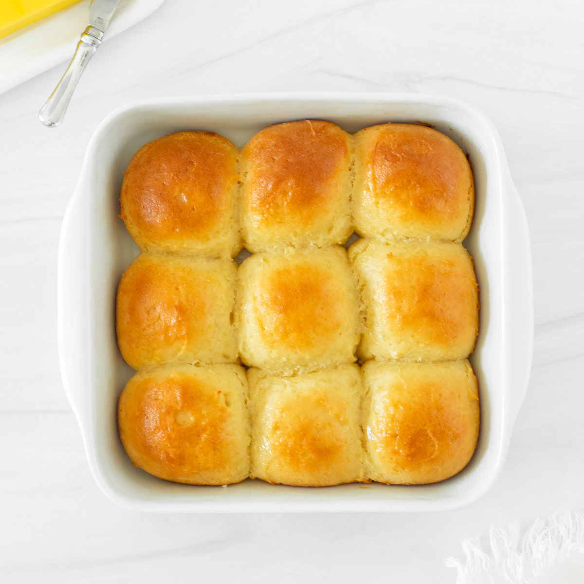 These gluten-free dinner rolls are the perfect soft and buttery rolls made with a blend of gluten-free flours and yeast for delicious homemade rolls.