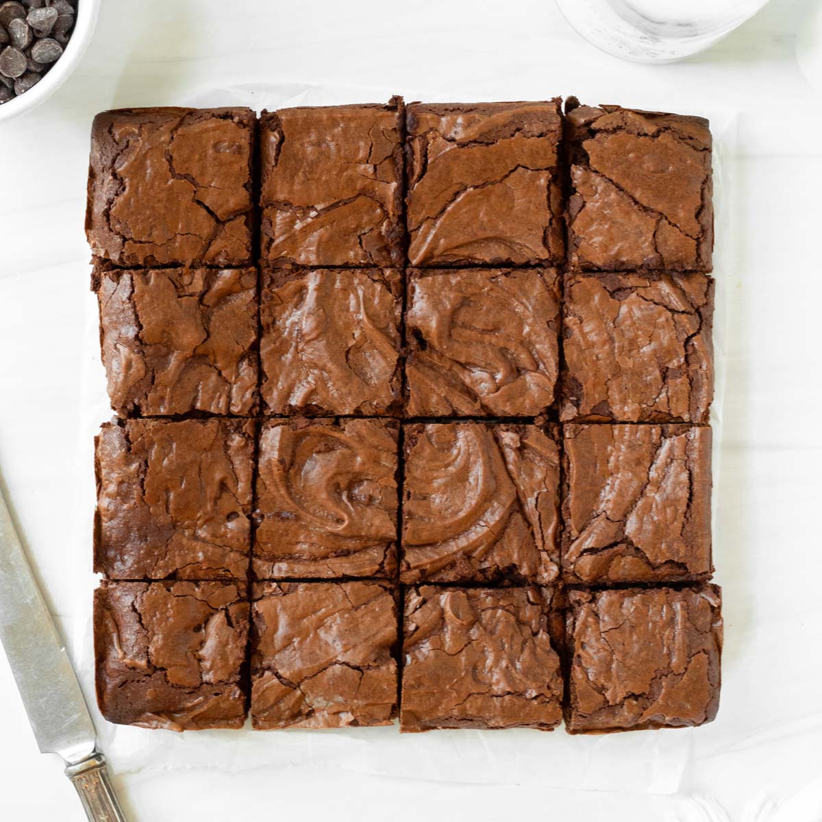 These fudgy brownies are a classic homemade brownie with a crinkle topping and fudgy chocolate middle. Made with simple, pantry-staple ingredients, these brownies are an easy dessert perfect for any occasion.