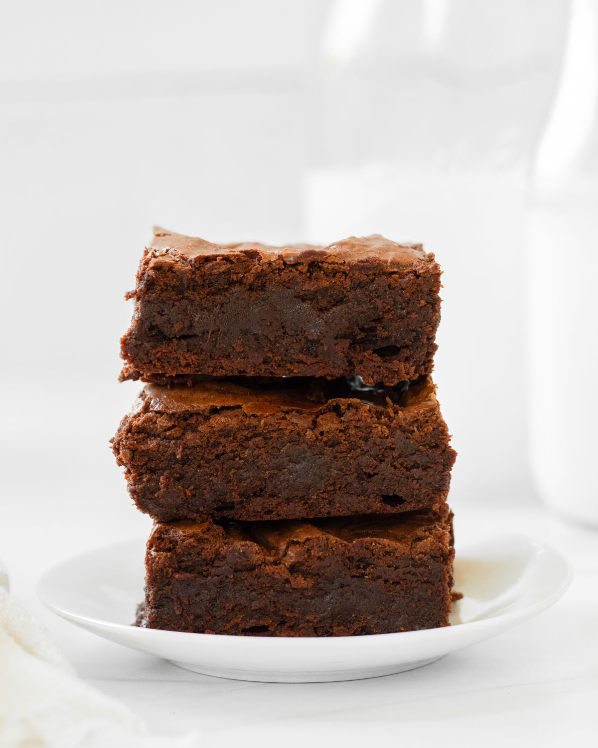 These fudgy brownies are a classic homemade brownie with a crinkle topping and fudgy chocolate middle. Made with simple, pantry-staple ingredients, these brownies are an easy dessert perfect for any occasion.