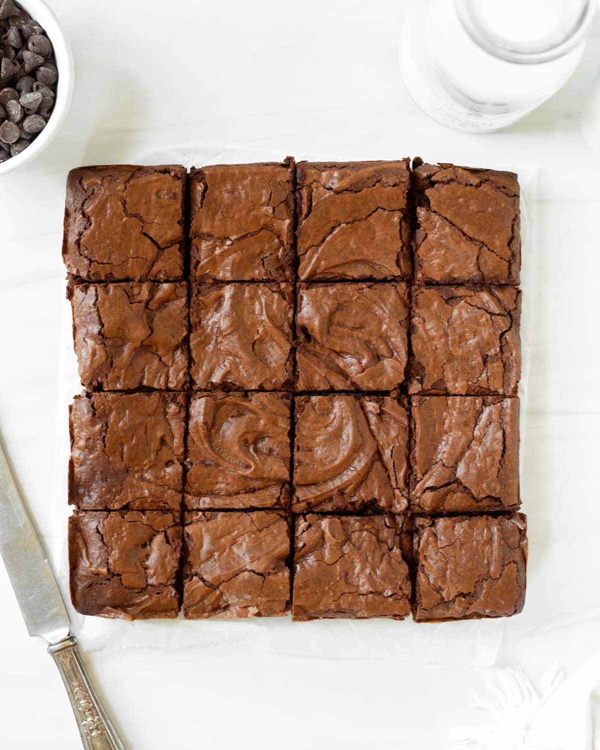 These fudgy brownies are a classic homemade brownie with a crinkle topping and fudgy chocolate middle. Made with simple, pantry-staple ingredients, these brownies are an easy dessert perfect for any occasion.