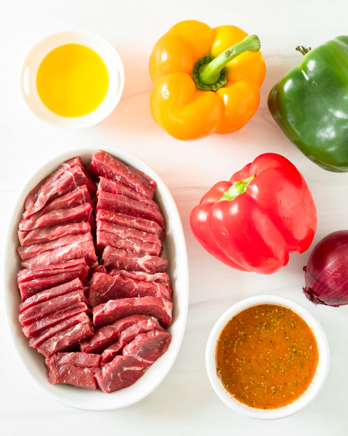 These steak fajitas are an easy one-pan recipe made with steak and vegetables cooked in a homemade fajita marinade for excellent flavor. This recipe is the perfect weeknight dinner and a kid-friendly meal.