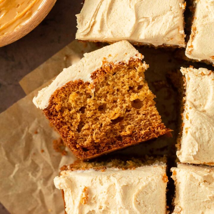 This peanut butter cake with peanut butter frosting is an easy snack cake recipe. This one-pan cake recipe is a soft and moist peanut butter cake topped with a creamy peanut butter frosting.