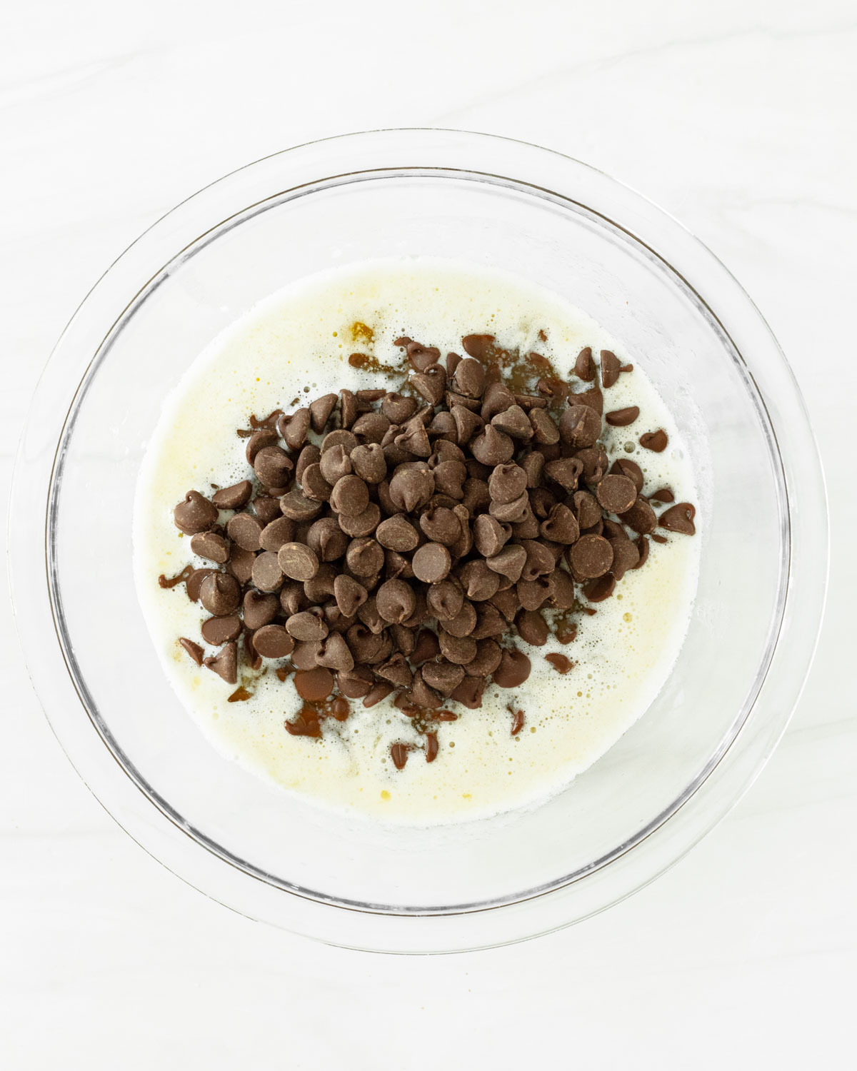 Step 3. In a separate bowl, melt butter and add chocolate chips