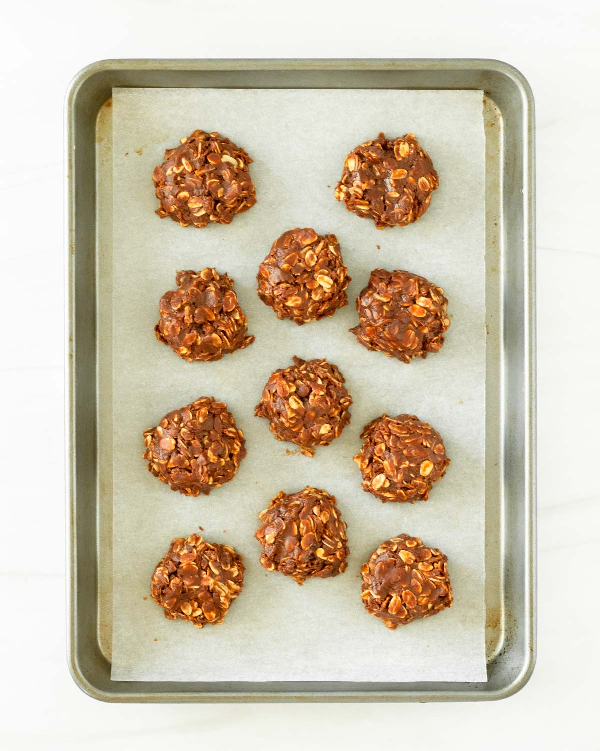 Step 6. Use a cookie scoop to scoop the cookies onto a sheet pan then chill in the fridge