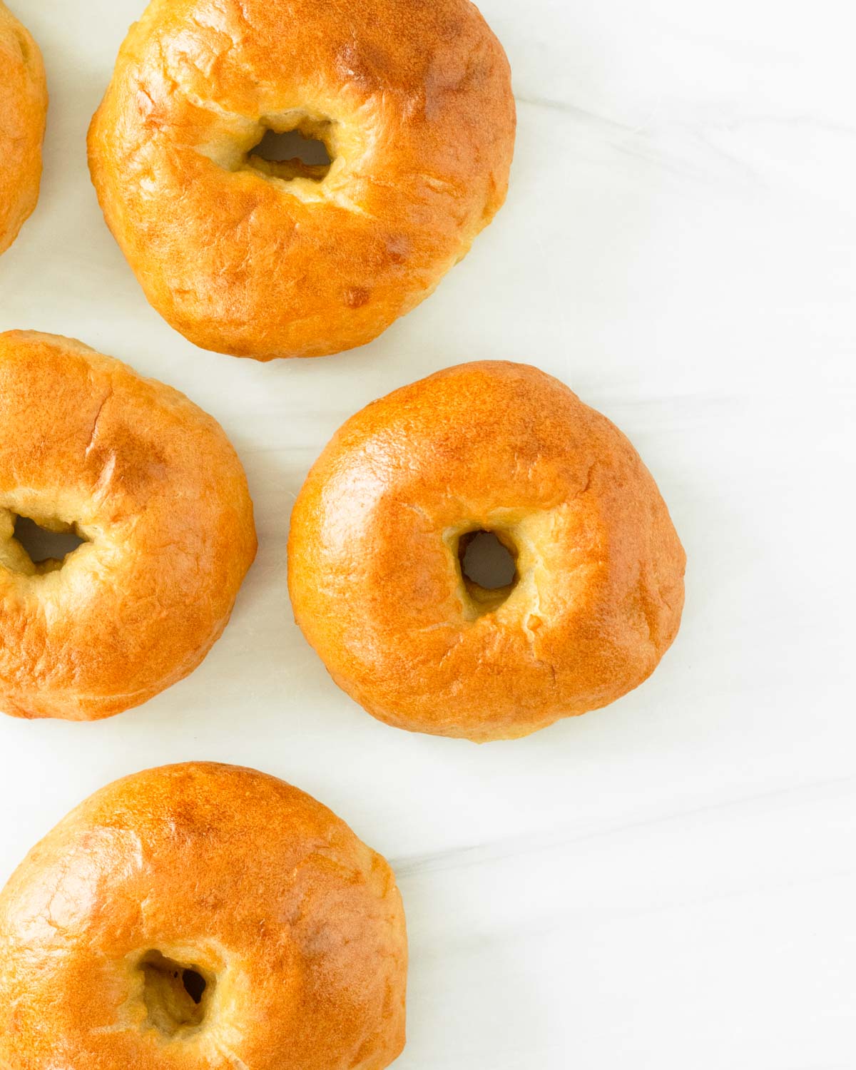 These sourdough bagels are the perfect homemade bagels made with a sourdough starter. These homemade bagels are an easy breakfast recipe and great for storing in the freezer to enjoy later!
