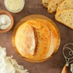 This guide to how to make sourdough bread is an easy-to-follow step-by-step guide to making classic sourdough bread from scratch. This recipe calls for 4 simple ingredients to make delicious, homemade bread.