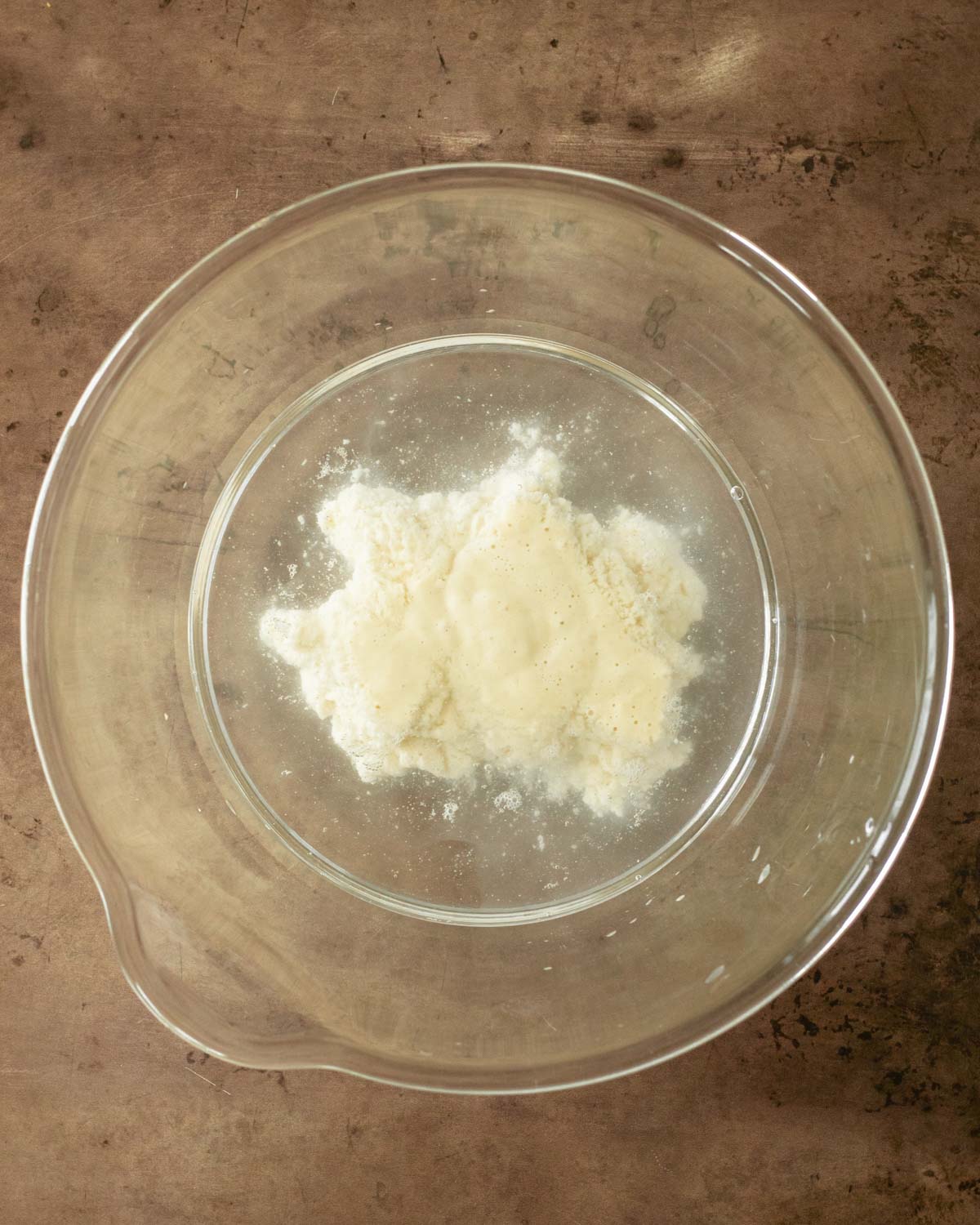 Step 1. Add the water and sourdough starter (leaven) to the bowl