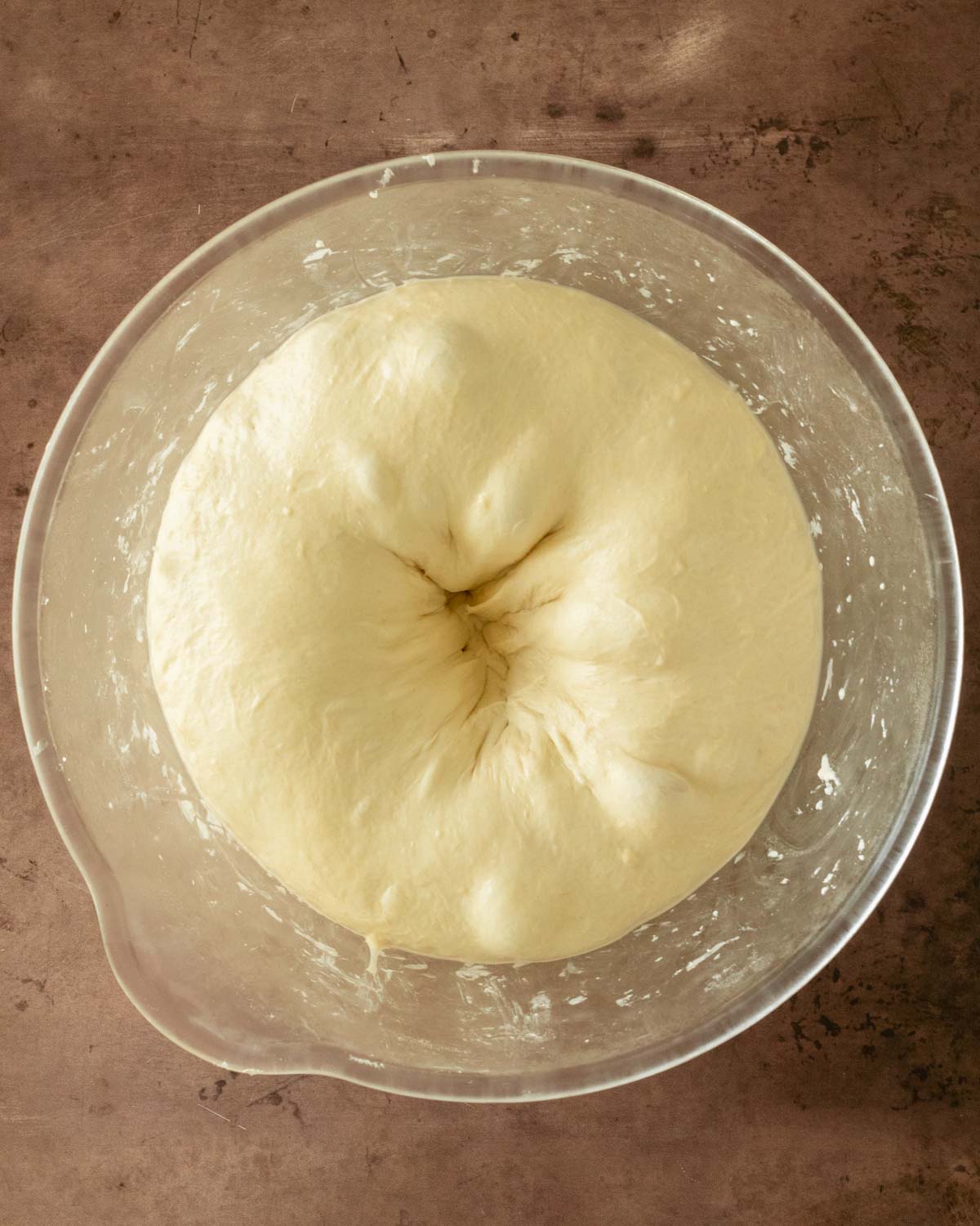 Step 10. Use your fist to punch the center of the dough