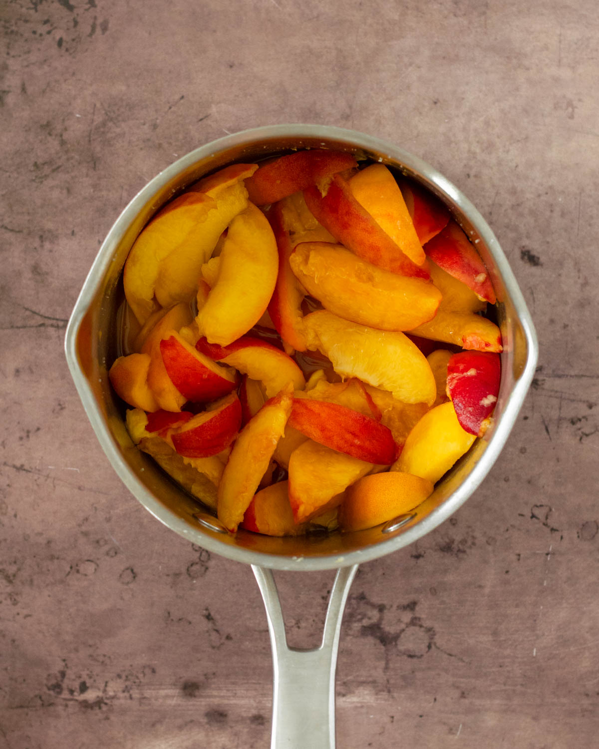 Step 2. Boil the peaches