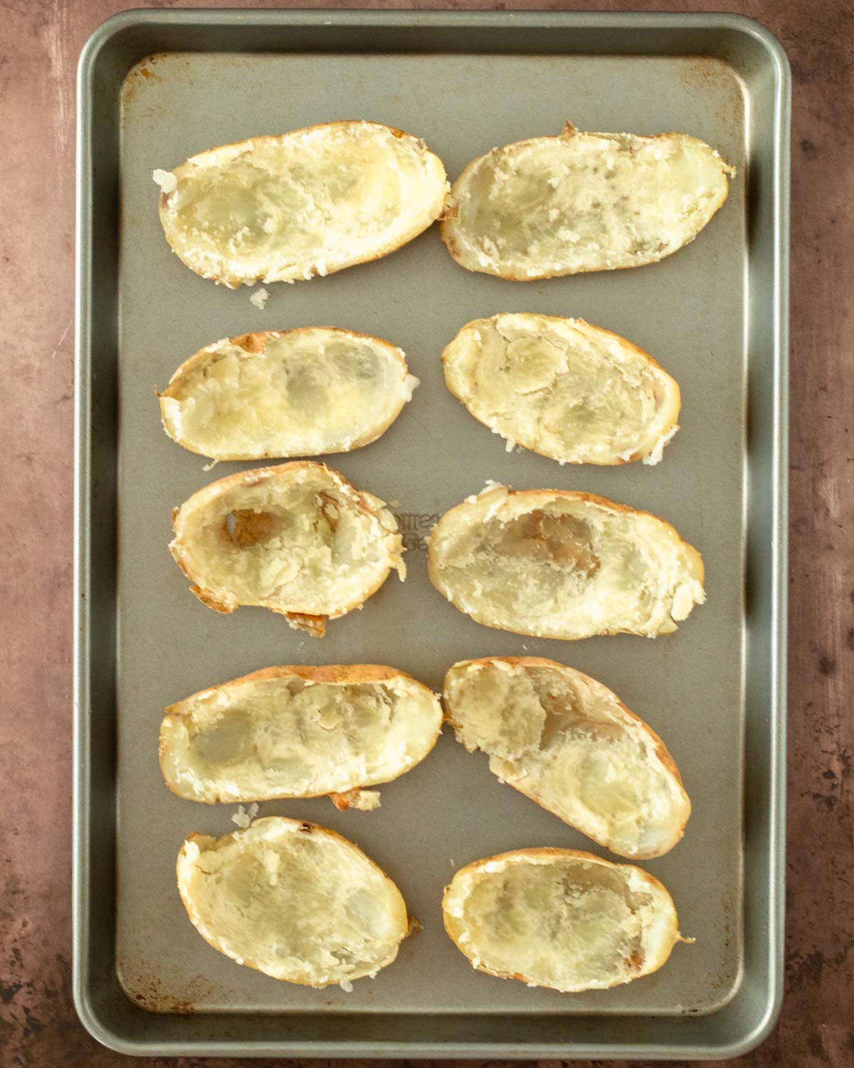 Step 3. Remove the insides of the potatoes from the skins