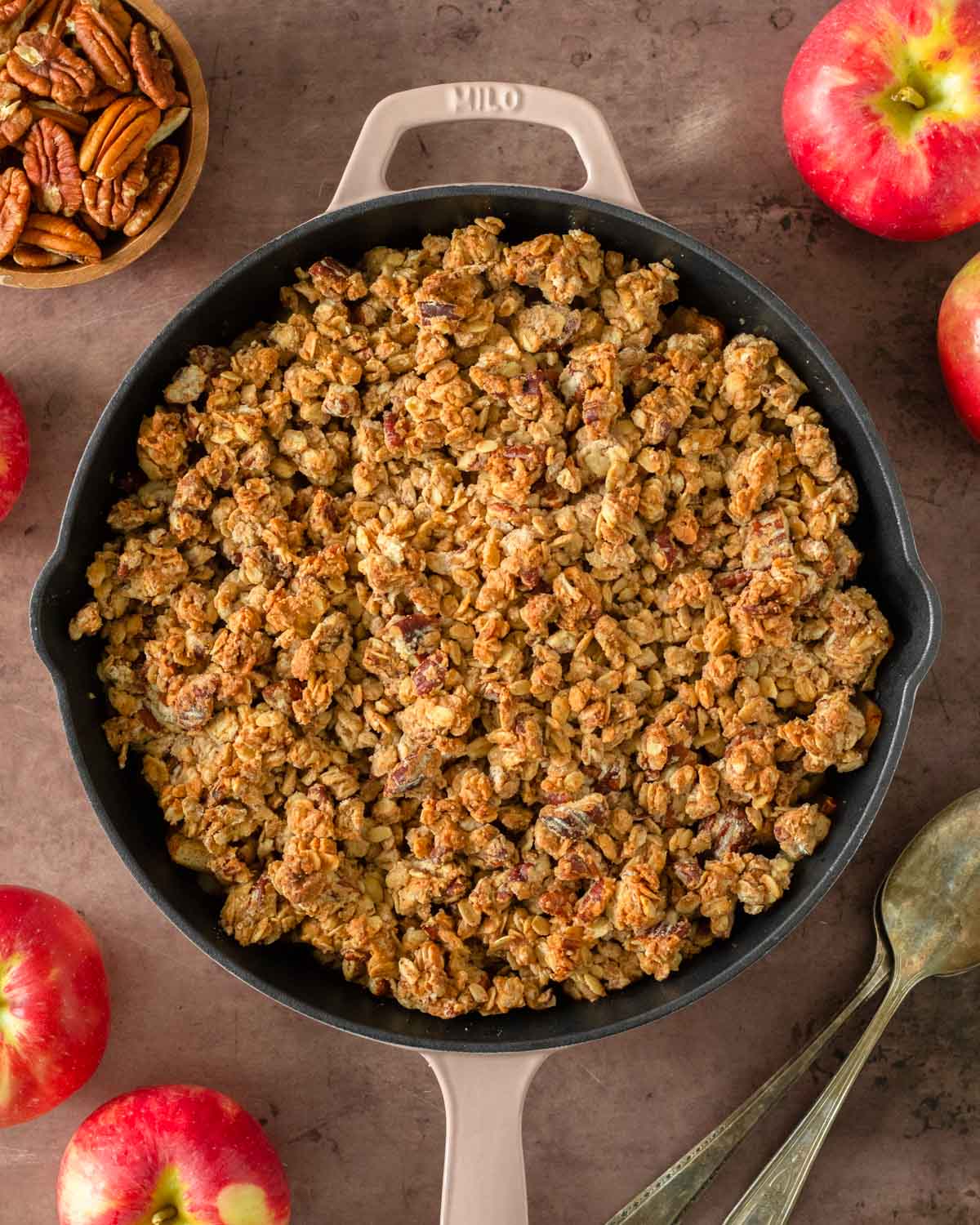 This skillet apple crisp is a classic fall dessert made with freshly picked apples tossed in maple syrup and cinnamon and baked in a skillet with a flavorful crisp topping.