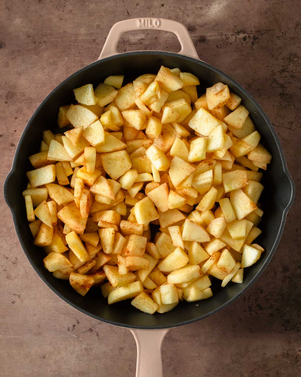 Step 3. Transfer the apples to a skillet or baking dish