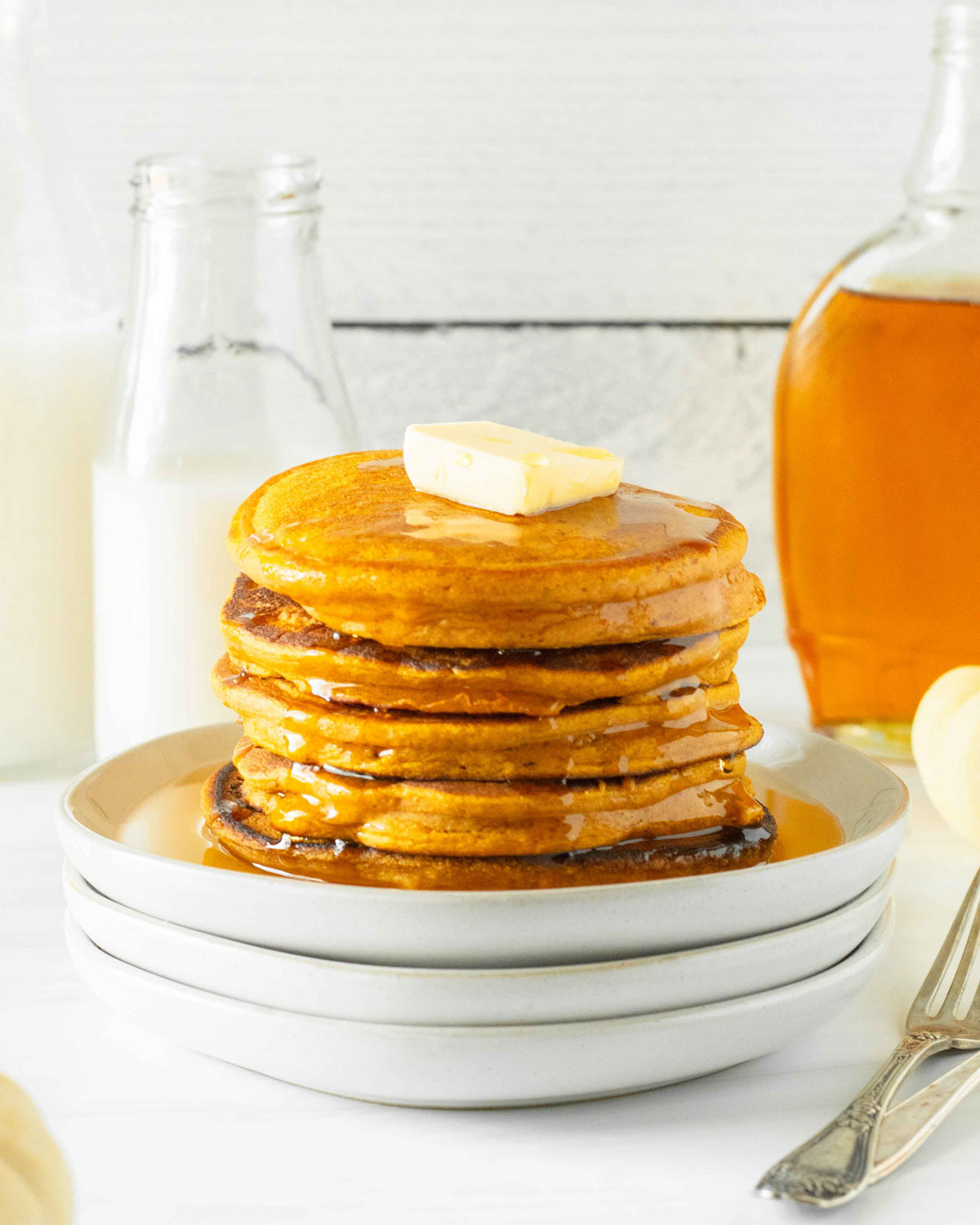 These sourdough pumpkin pancakes are an easy sourdough recipe made with simple ingredients including pumpkin puree, classic fall spices and sourdough discard to make delicious pumpkin pancakes.
