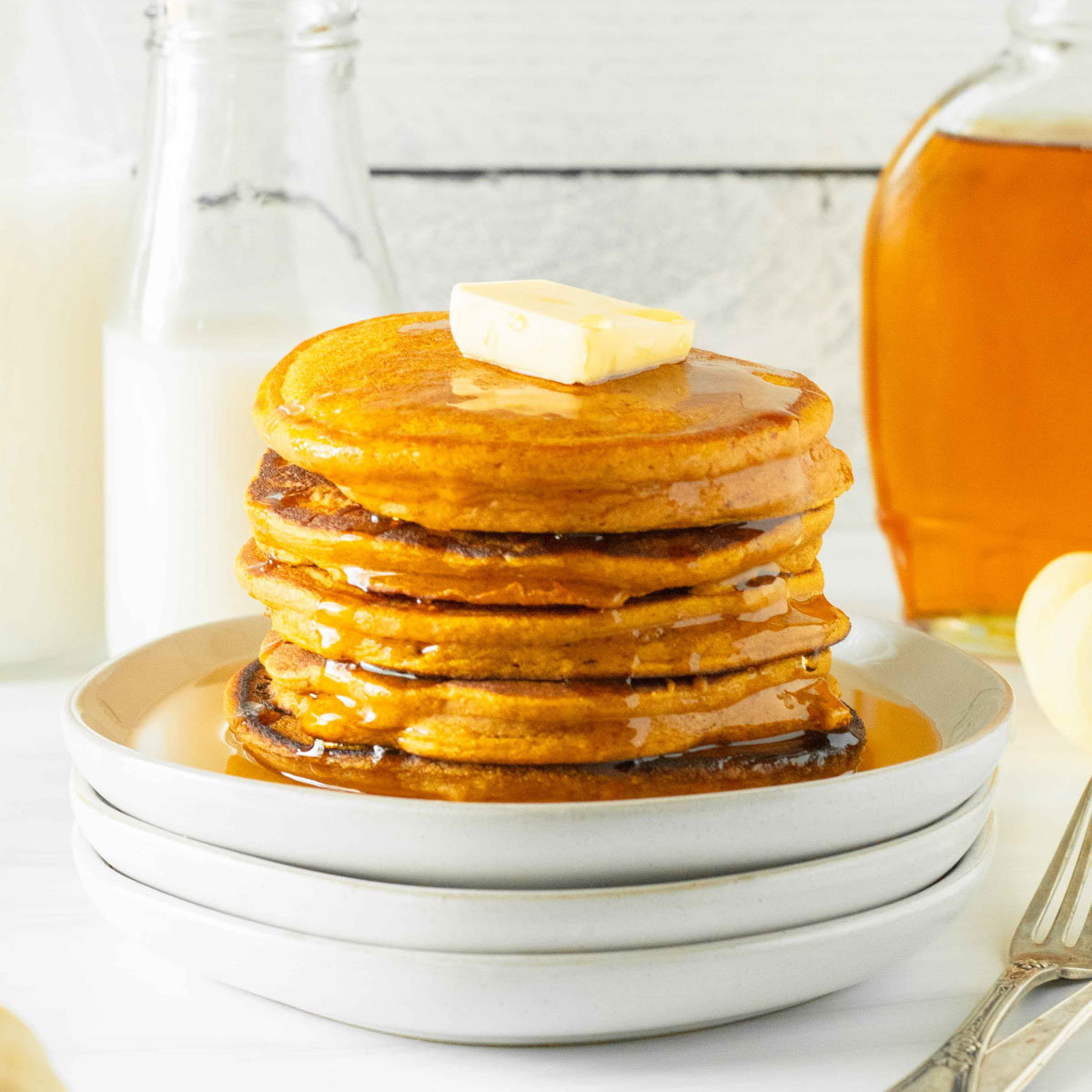 These sourdough pumpkin pancakes are an easy sourdough recipe made with simple ingredients including pumpkin puree, classic fall spices and sourdough discard to make delicious pumpkin pancakes.