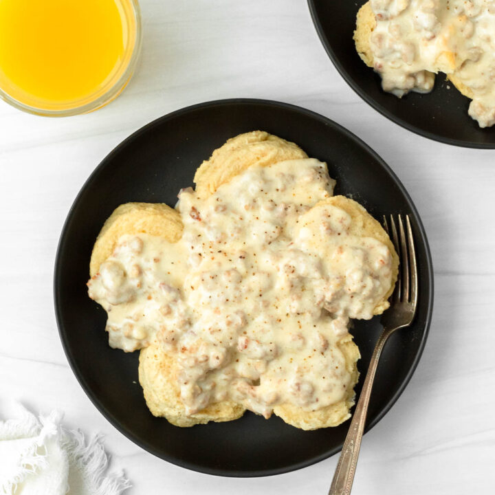 This biscuits and gravy recipe is a classic comfort food breakfast recipe made with a thick sausage gravy served over flaky buttery biscuits.