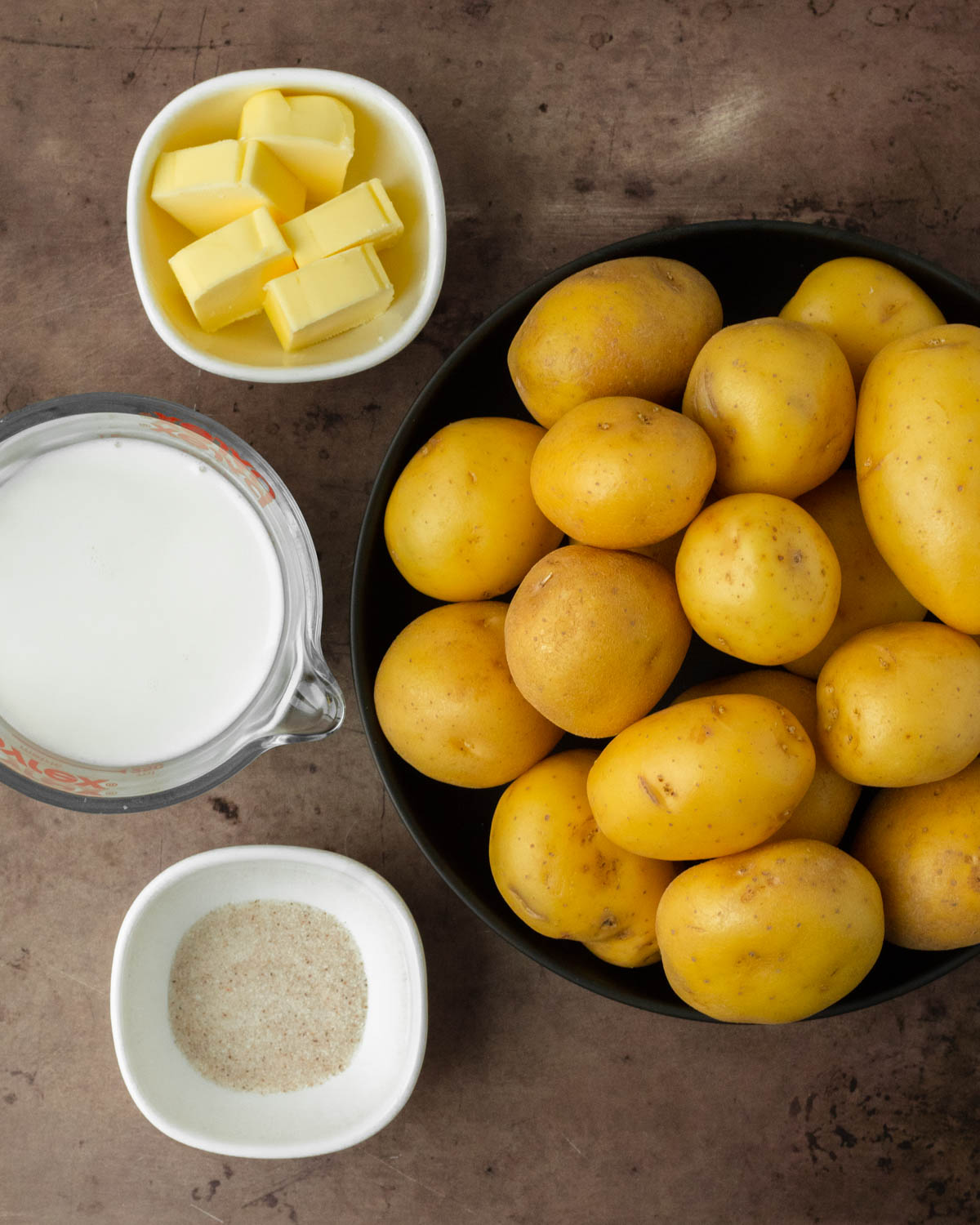 These classic mashed potatoes are a simple, flavorful Yukon Gold mashed potato recipe perfect for an easy side dish for a weeknight dinner and a great holiday side dish recipe.