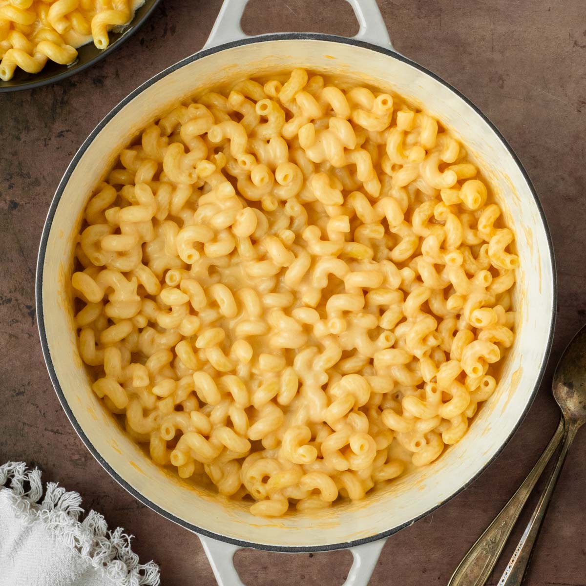 This creamy one-pot stovetop macaroni and cheese recipe is a delicious three-cheese macaroni and cheese perfect for an easy dinner recipe and great as a holiday side dish.