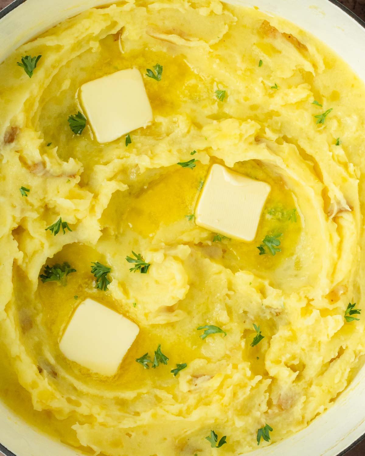 These classic mashed potatoes are a simple, flavorful Yukon Gold mashed potato recipe perfect for an easy side dish for a weeknight dinner and a great holiday side dish recipe.