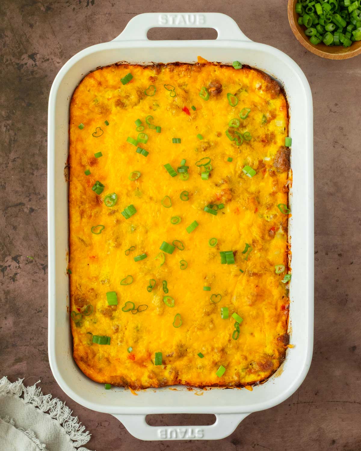 This breakfast casserole is a hearty and delicious breakfast recipe made filled with eggs, sausage, and potatoes for a filling and flavorful meal. We love making this recipe for a holiday breakfast recipe and it is also a great meal prep breakfast.