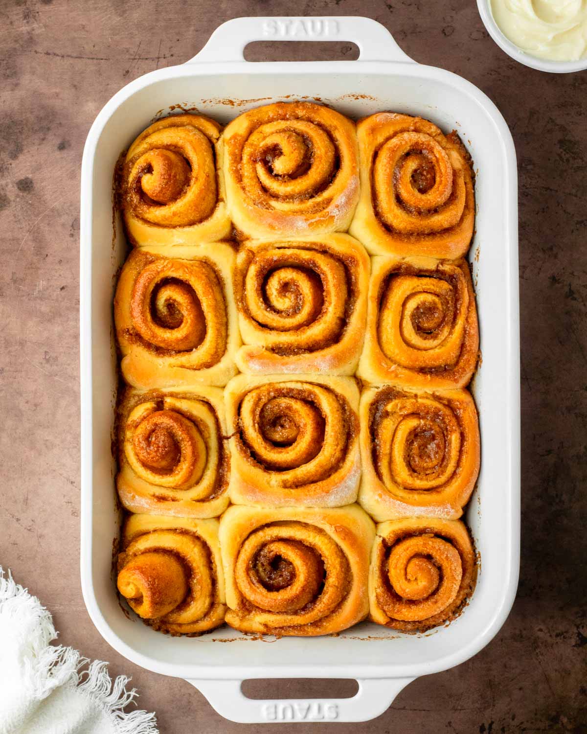 These cinnamon rolls with cream cheese frosting are a classic cinnamon roll recipe made with pantry-staple ingredients for an easy and delicious homemade cinnamon roll.