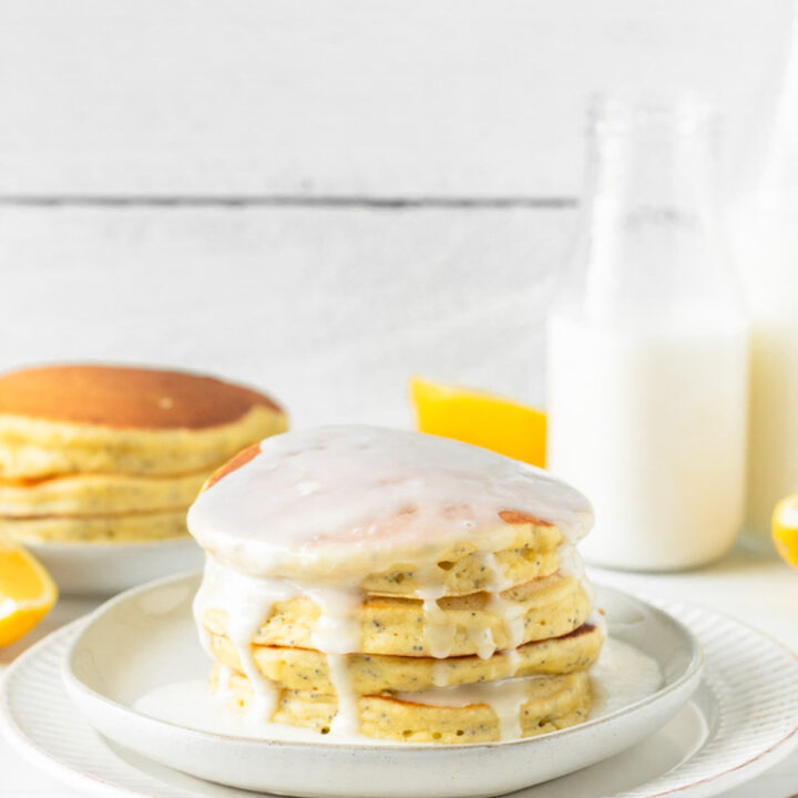 These lemon poppy seed pancakes are a fluffy, classic pancake filled with fresh lemon juice and poppy seeds for a delicious spring breakfast.
