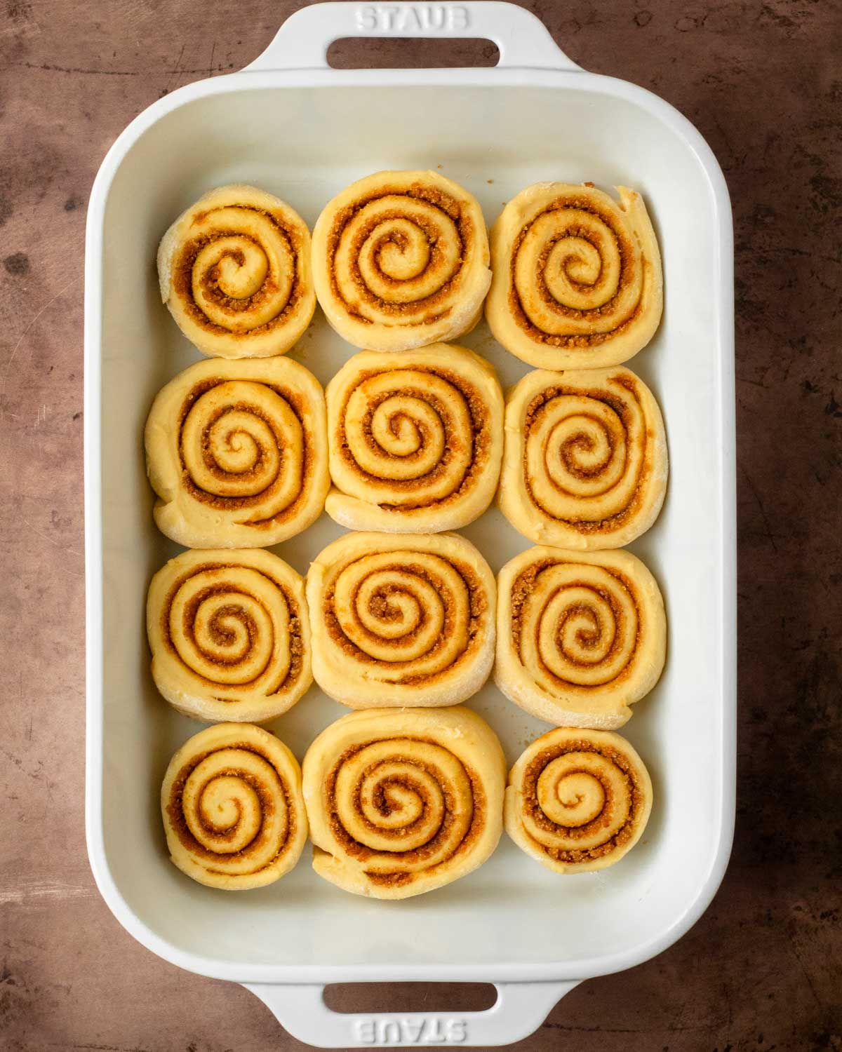 Step 2. Assemble the cinnamon rolls and place in a baking pan.