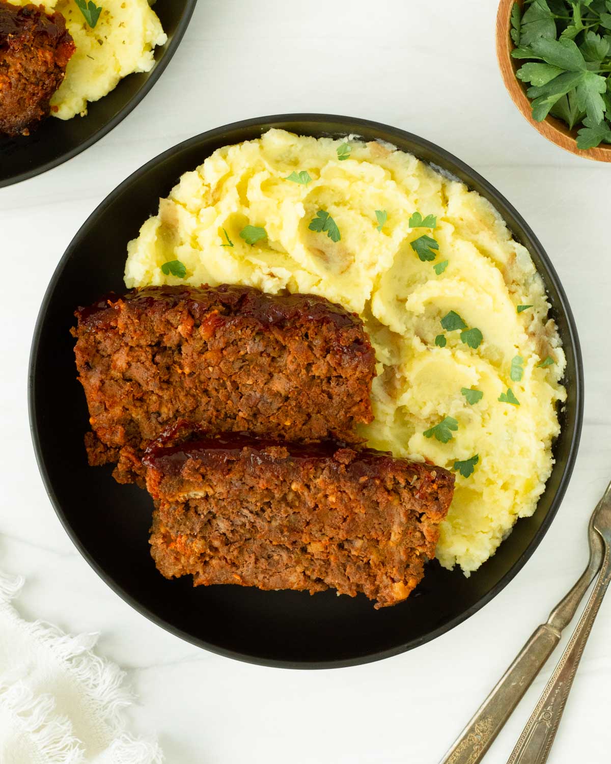 This venison meatloaf is a classic comfort food and easy venison recipe perfect for an easy dinner. Made with ground venison and staple pantry ingredients, our classic meatloaf recipe is a filling dinner recipe that is also great for meal prep.