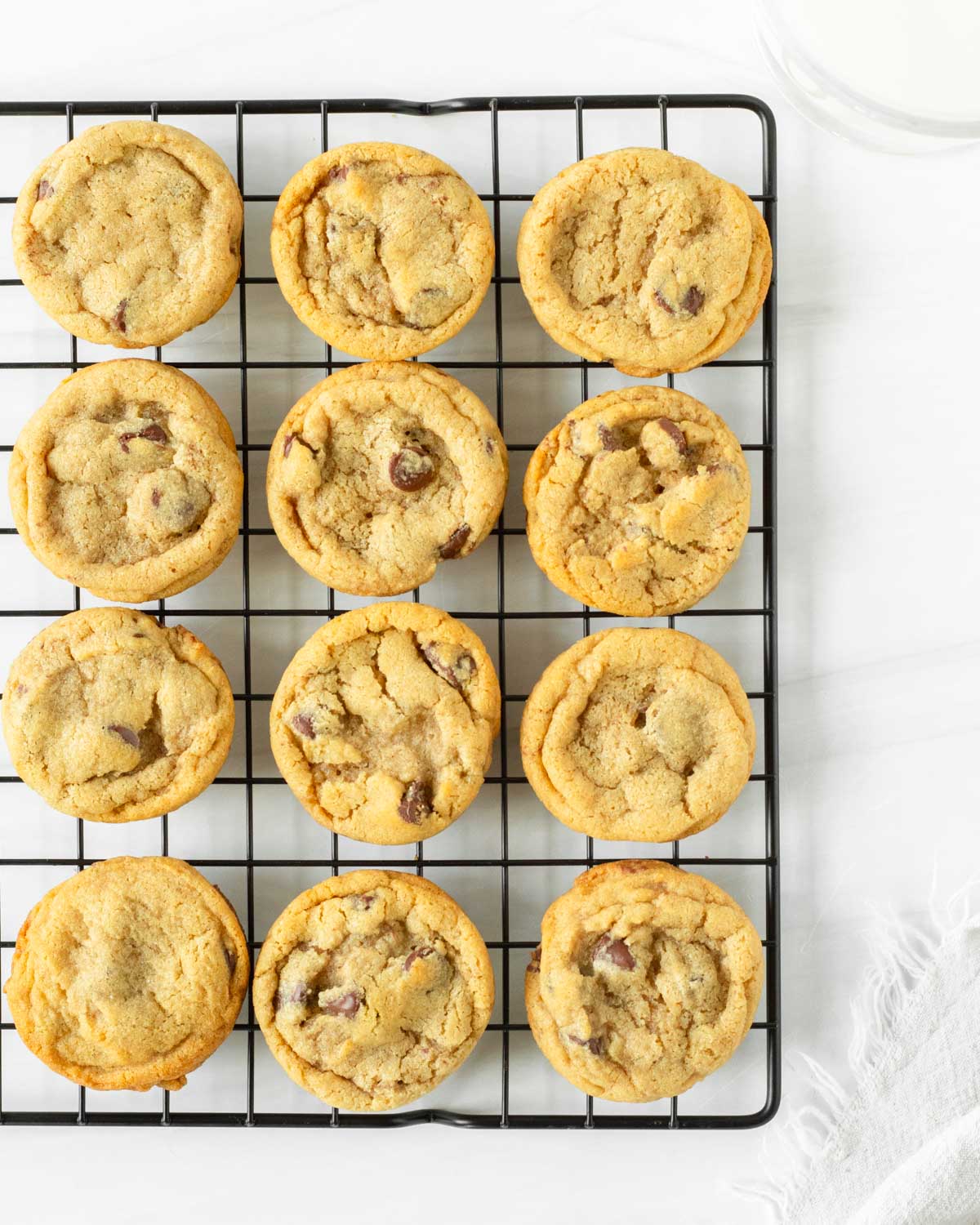 These gluten-free chocolate chip cookies are the best soft and chewy gluten-free cookies made with a gluten-free 1:1 flour blend and other pantry-staple ingredients for a delicious, classic chocolate chip cookie.
