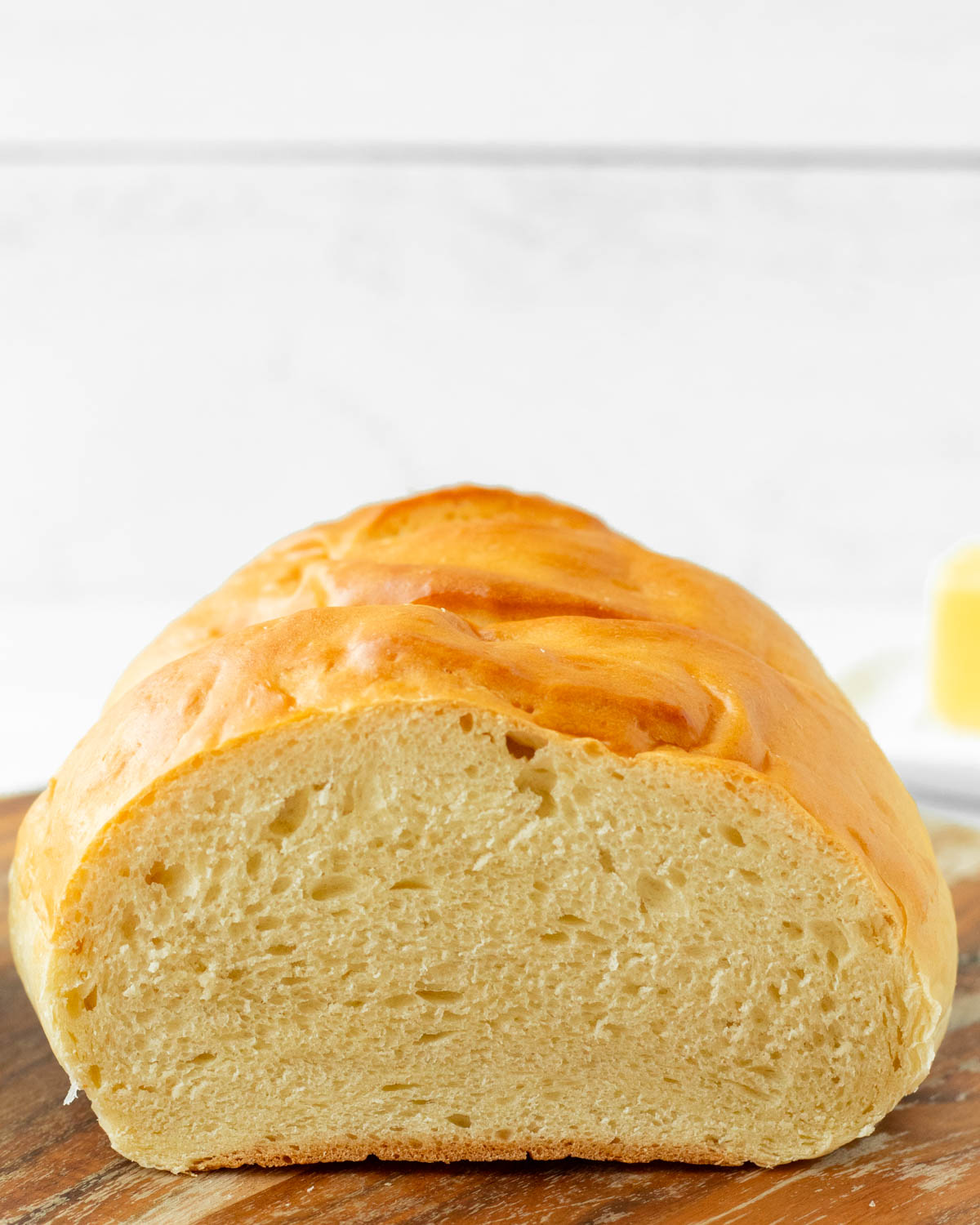 This homemade Italian bread recipe is an easy yeast bread recipe made with simple ingredients for a flavorful, soft bread perfect for using in French toast, sandwiches like grilled cheese, and making into garlic bread.