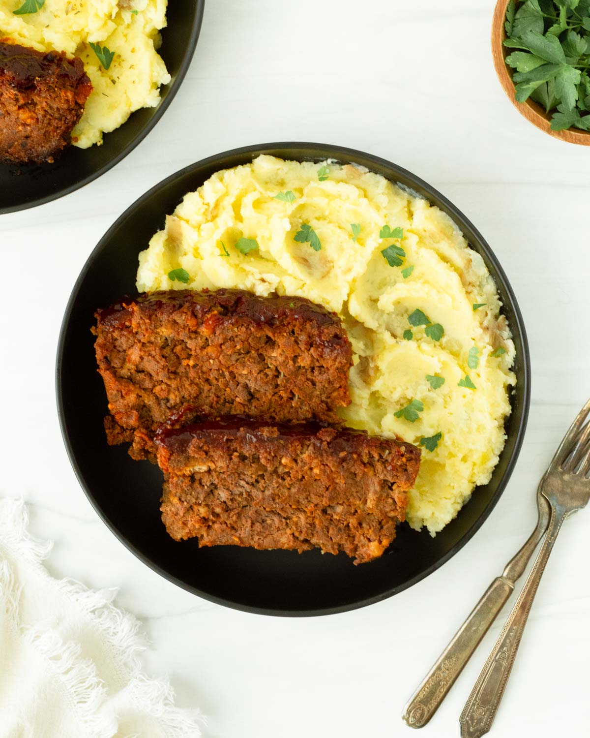 This venison meatloaf is a classic comfort food and easy venison recipe perfect for an easy dinner. Made with ground venison and staple pantry ingredients, our classic meatloaf recipe is a filling dinner recipe that is also great for meal prep.