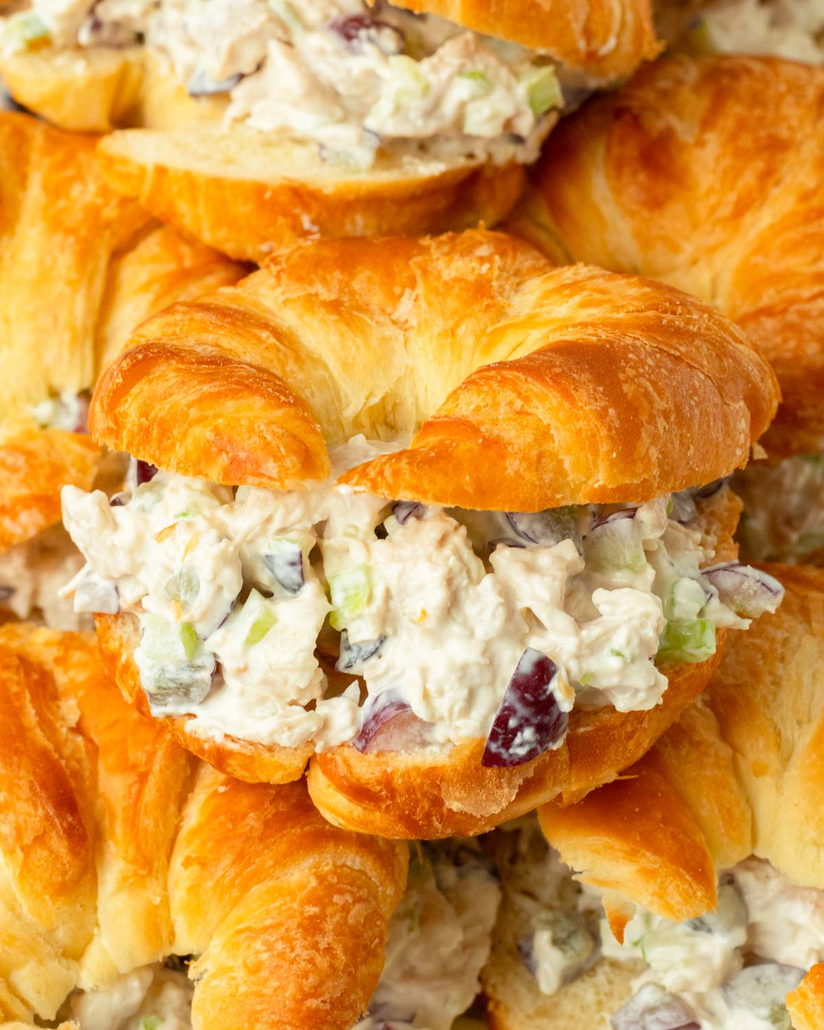 These chicken salad croissant sandwiches are a classic chicken salad made with simple ingredients and stuffed into a flaky, buttery croissant for a quick and flavorful meal.