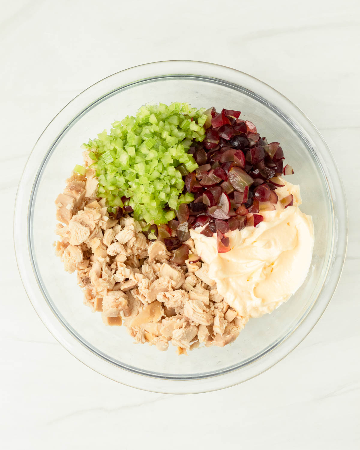 Step 1. Add the chicken salad ingredients to a bowl