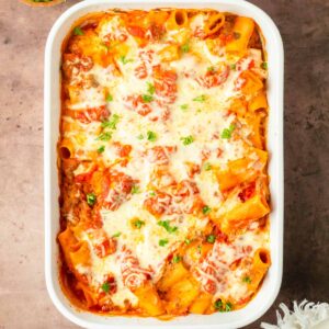 This venison baked ziti is an easy and delicious pasta dish made with venison meat sauce, noodles and cheese layered in a baking dish for a filling and flavorful dinner.