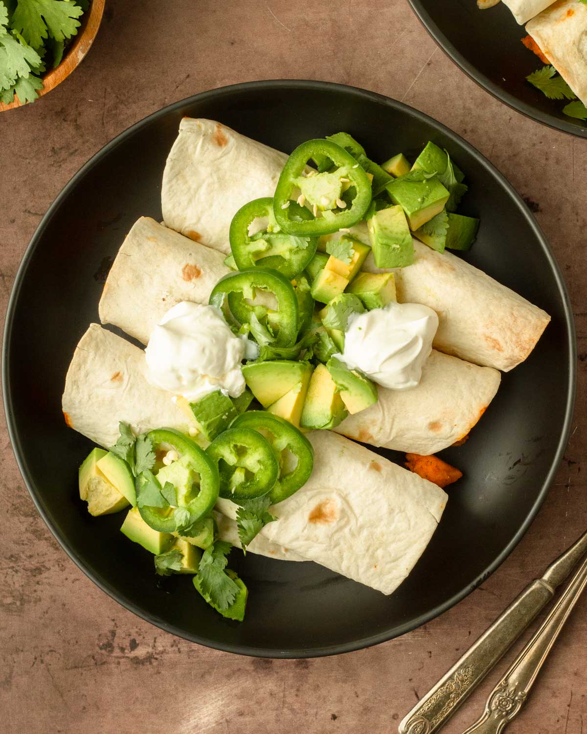These green chile chicken taquitos are an easy dinner made with tortillas stuffed with a flavorful green chile chicken filling and cheese perfect for a quick weeknight dinner and great for meal prep.