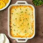 This cheesy corn dip is a quick, easy and flavorful dip recipe made with simple ingredients including corn, cheese, sour cream, mayonnaise, and spices perfect for a crowd-pleaser appetizer.