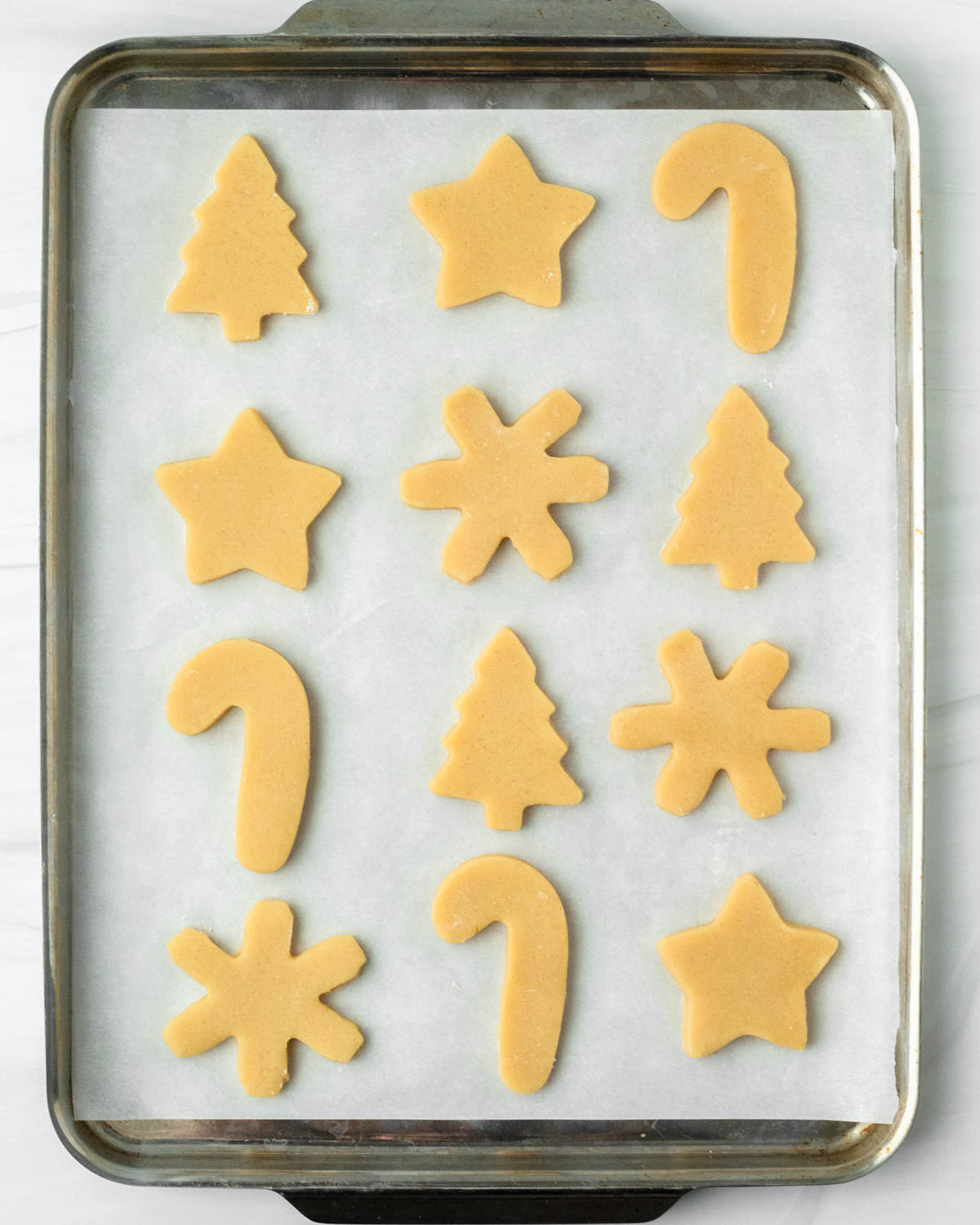 Step 3. Roll the dough out, cut into shapes, and place on a sheet pan