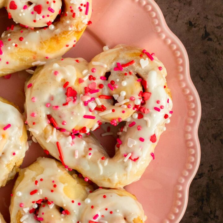 These heart shaped cinnamon rolls are the best classic soft, fluffy cinnamon rolls with a gooey cinnamon sugar filling and the perfect easy and delicious homemade Valentine's day treat.