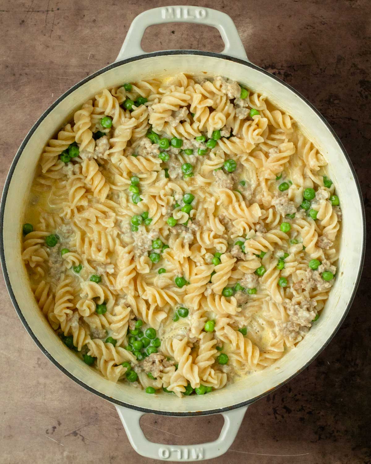 Step 3. Add the boiled noodles and stir to coat with sauce before serving