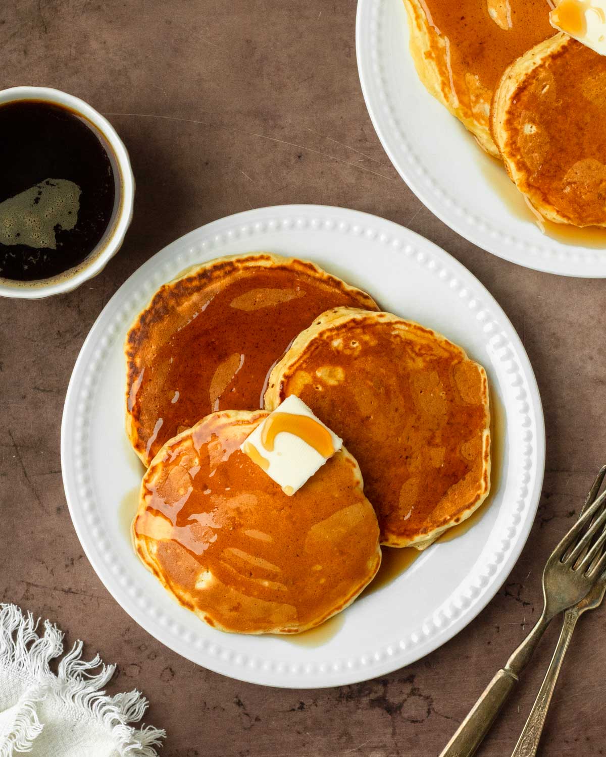 These homemade pancakes are thick and fluffy pancakes made with simple, pantry-staple ingredients for a classic homemade breakfast.