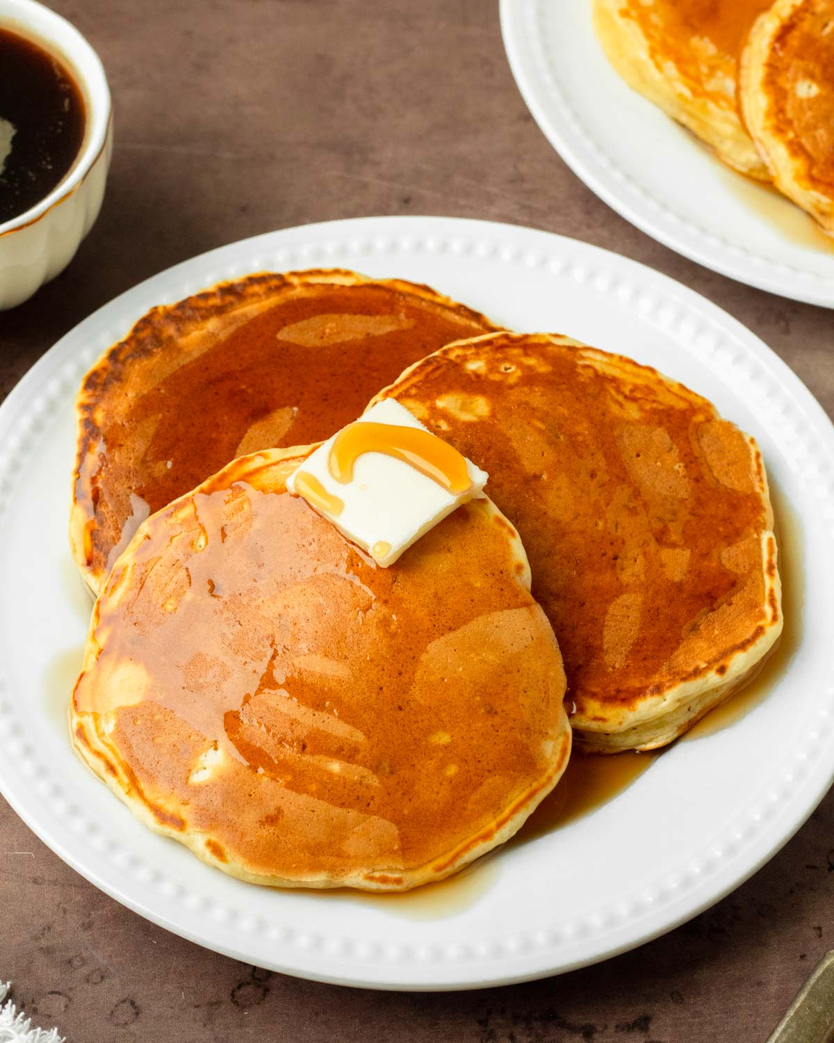 These homemade pancakes are thick and fluffy pancakes made with simple, pantry-staple ingredients for a classic homemade breakfast.