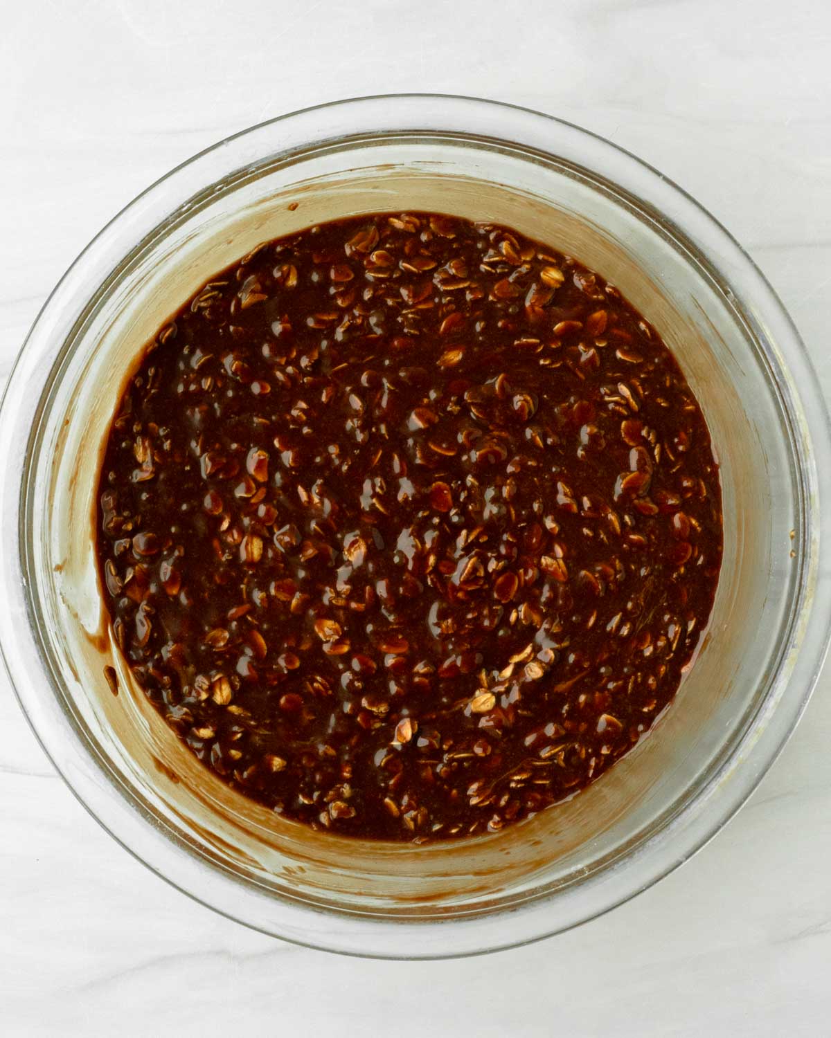 Step 2. Mix the chocolate sauce, peanut butter and oats together