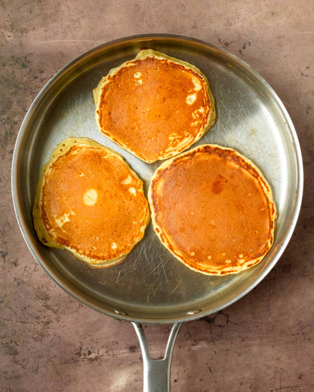 Step 3. Flip the pancakes over halfway through cooking to cook all the way through
