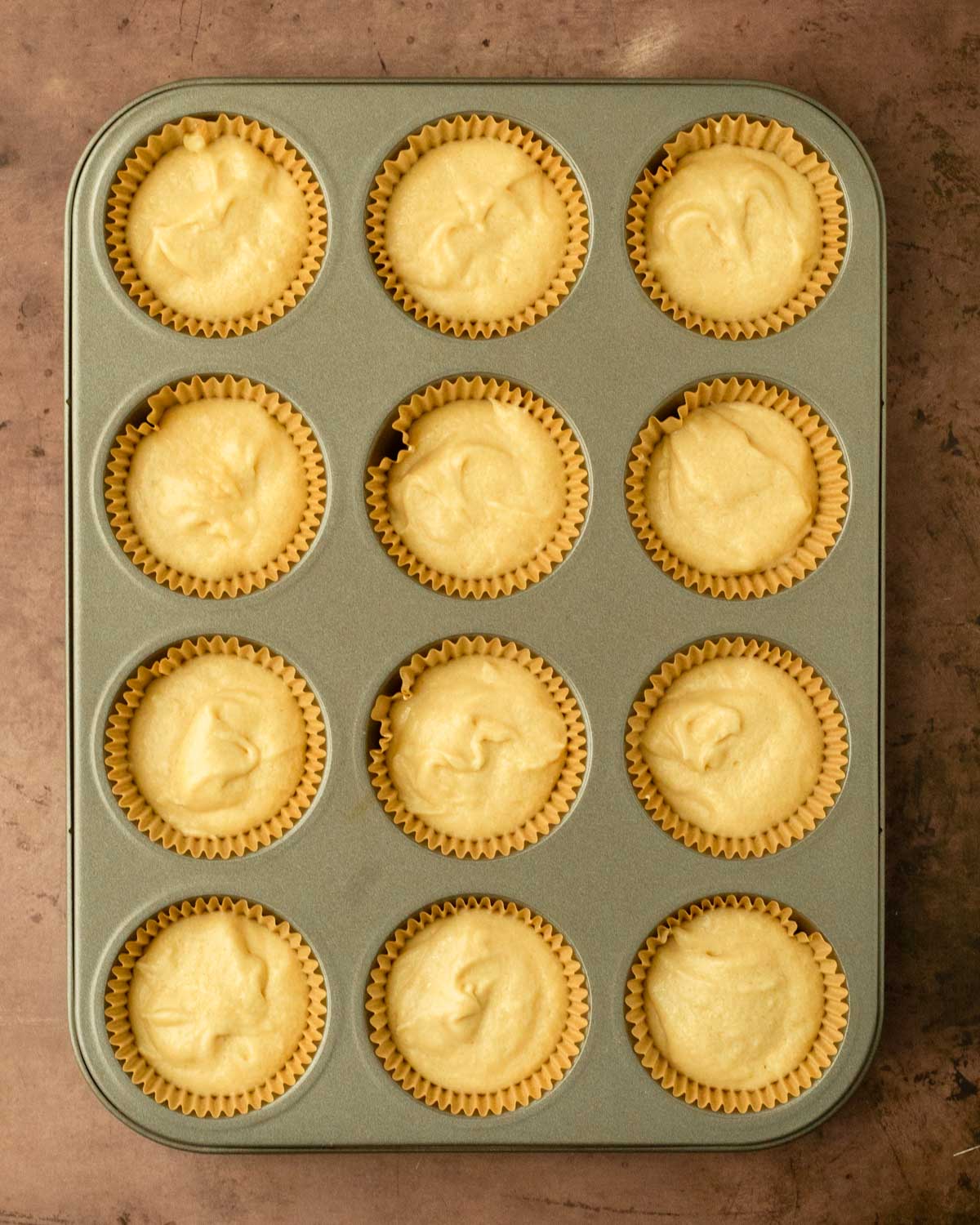 Step 2. Scoop the cupcake batter into the cupcake pan