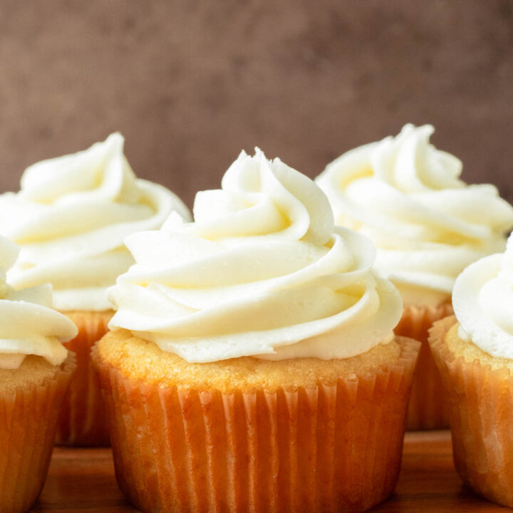 These vanilla cupcakes are deliciously soft homemade cupcakes with a rich vanilla flavor and topped with smooth and creamy buttercream frosting.