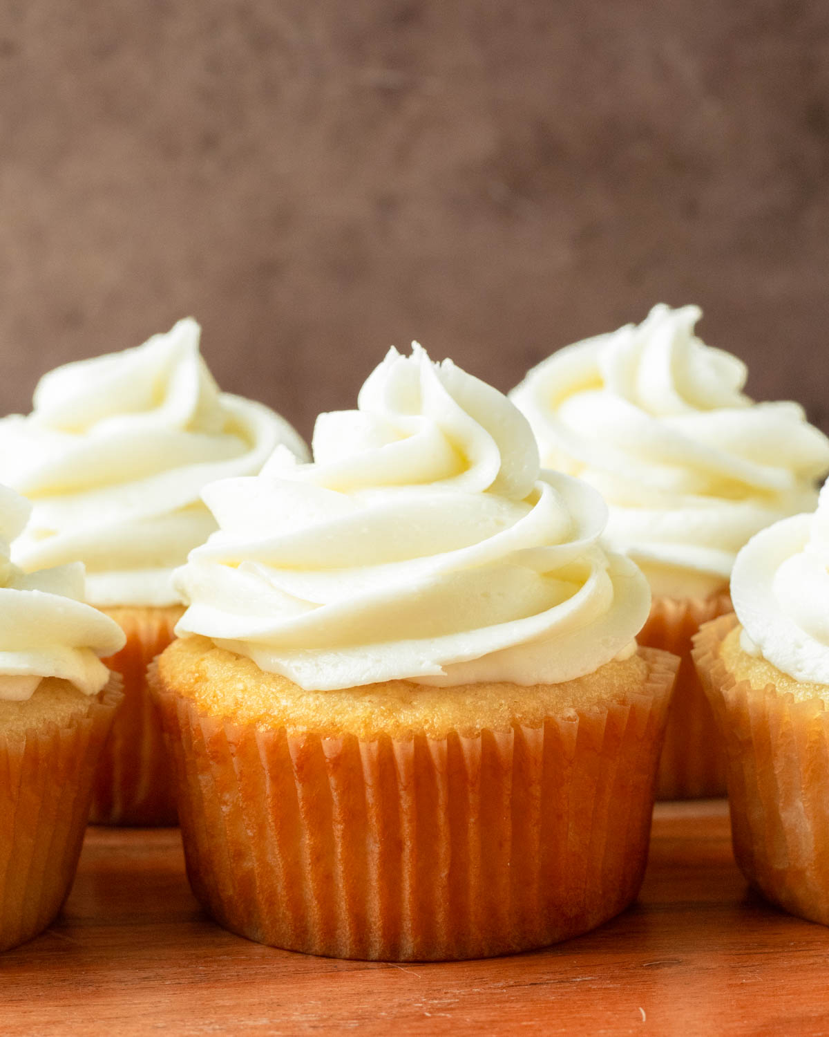 These vanilla cupcakes are deliciously soft homemade cupcakes with a rich vanilla flavor and topped with smooth and creamy buttercream frosting.