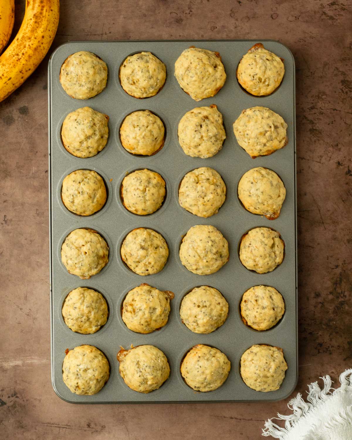 These mini banana muffins are easy, kid-friendly muffins recipe made with overripe bananas and have cottage cheese and chia seeds hidden inside for extra protein and nutrients.