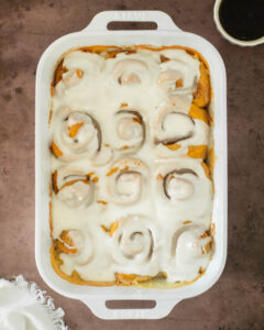 These pumpkin cinnamon rolls are the best classic soft and fluffy pumpkin cinnamon rolls made with pumpkin puree and fall spices, filled with a gooey cinnamon sugar filling and topped with a delicious cream cheese frosting.