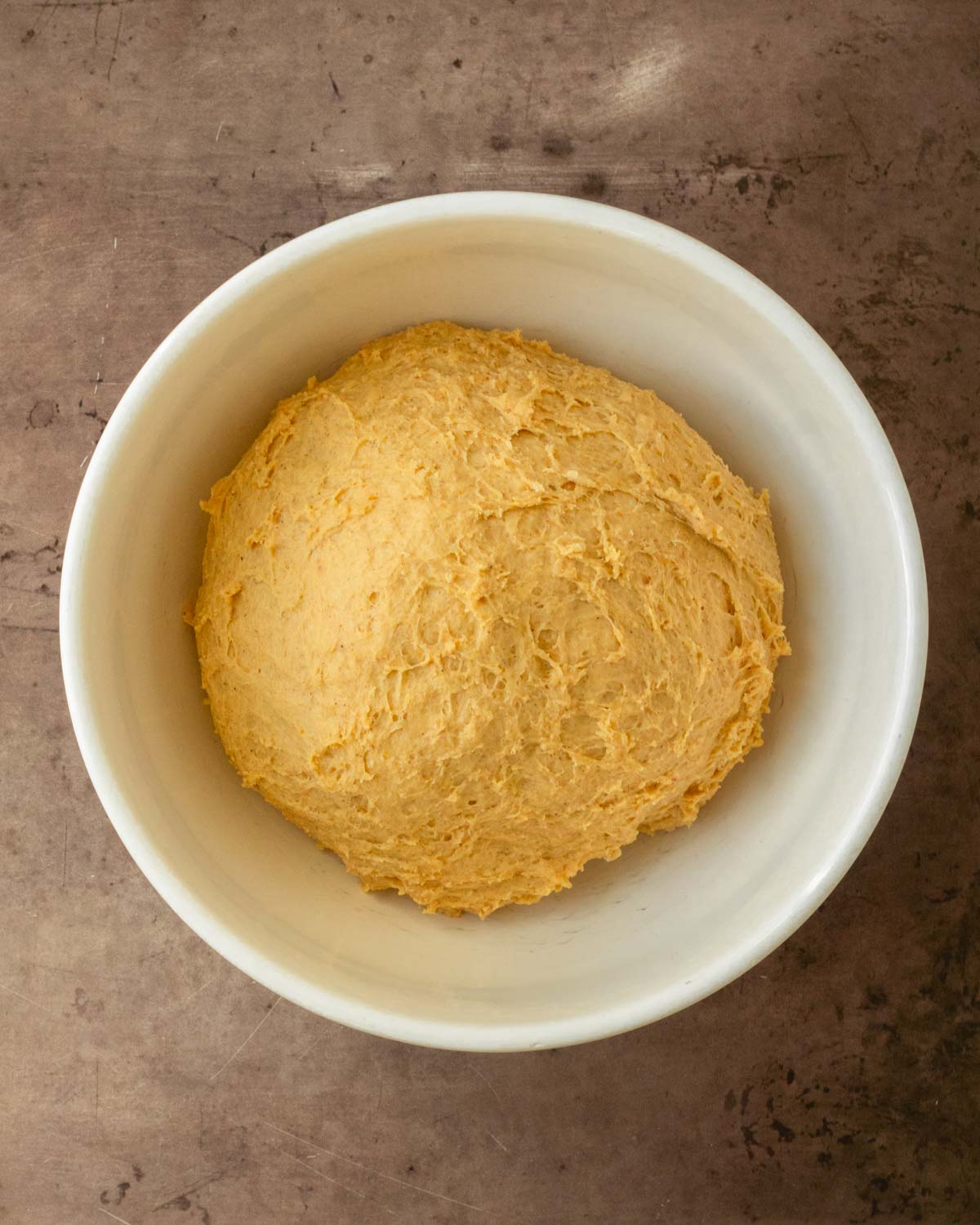 Step 1. Mix the pumpkin cinnamon roll dough together